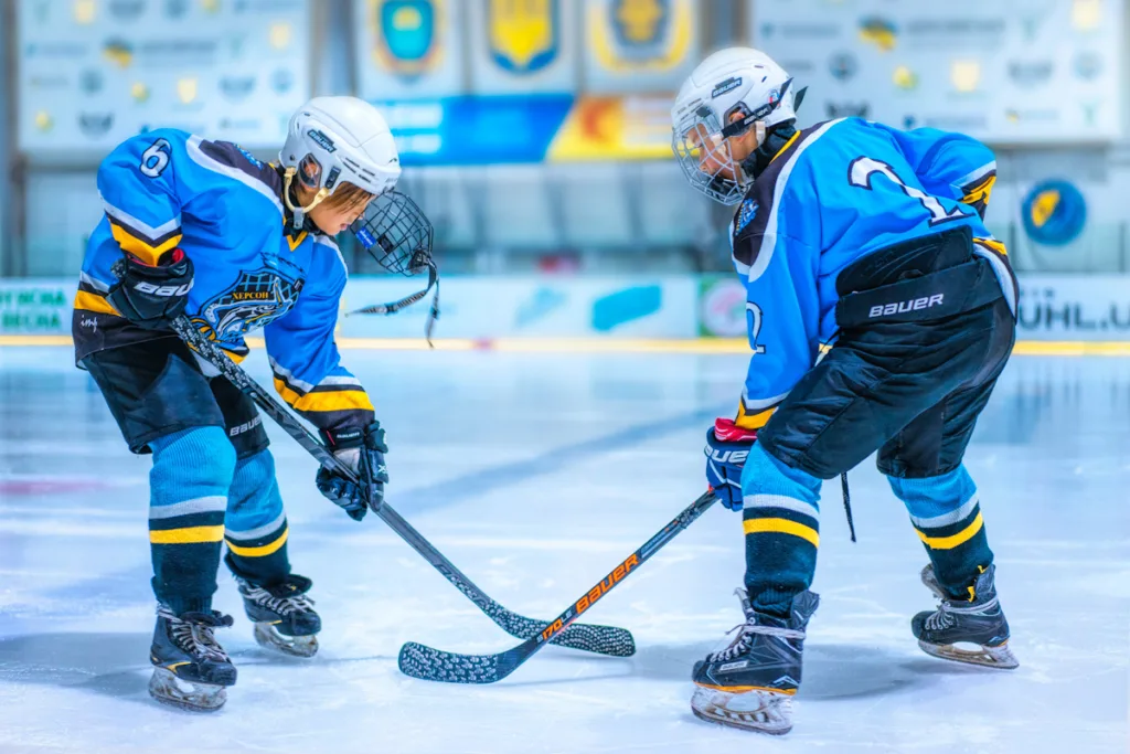 Two players from same team in blue for Ice Hockey