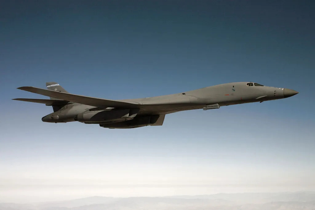 b-1b-lancer in flight above the clouds