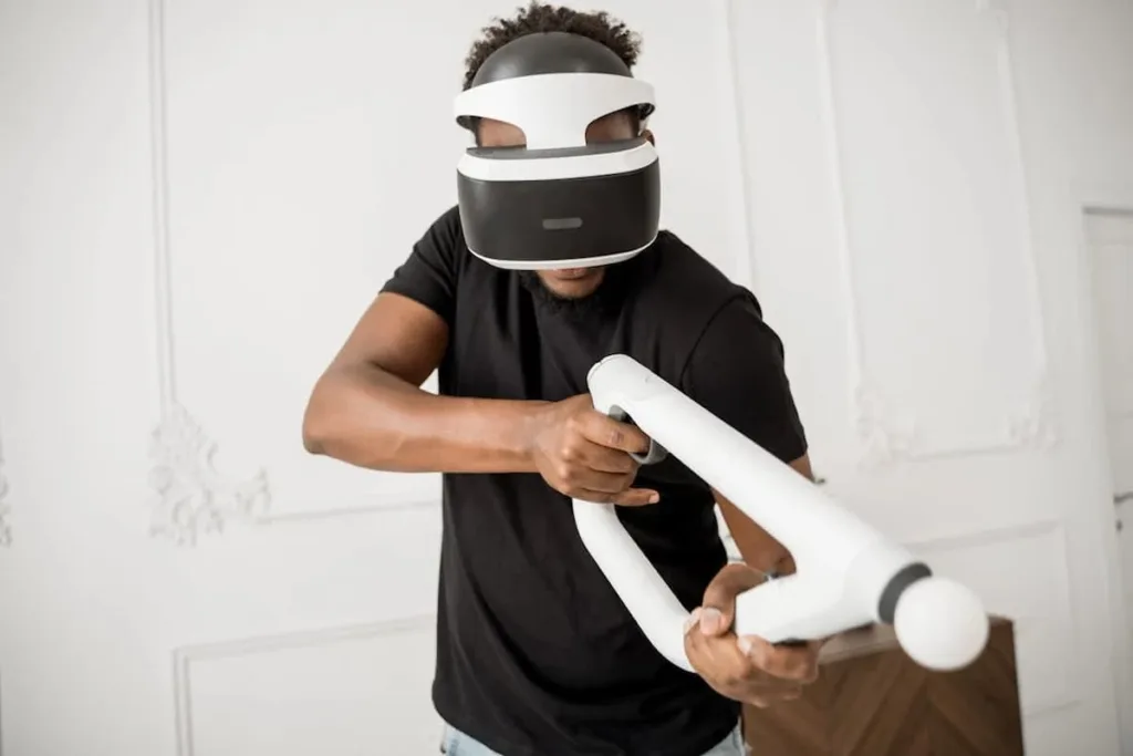 Man with VR headset and virtual gun during Gaming in the Metaverse