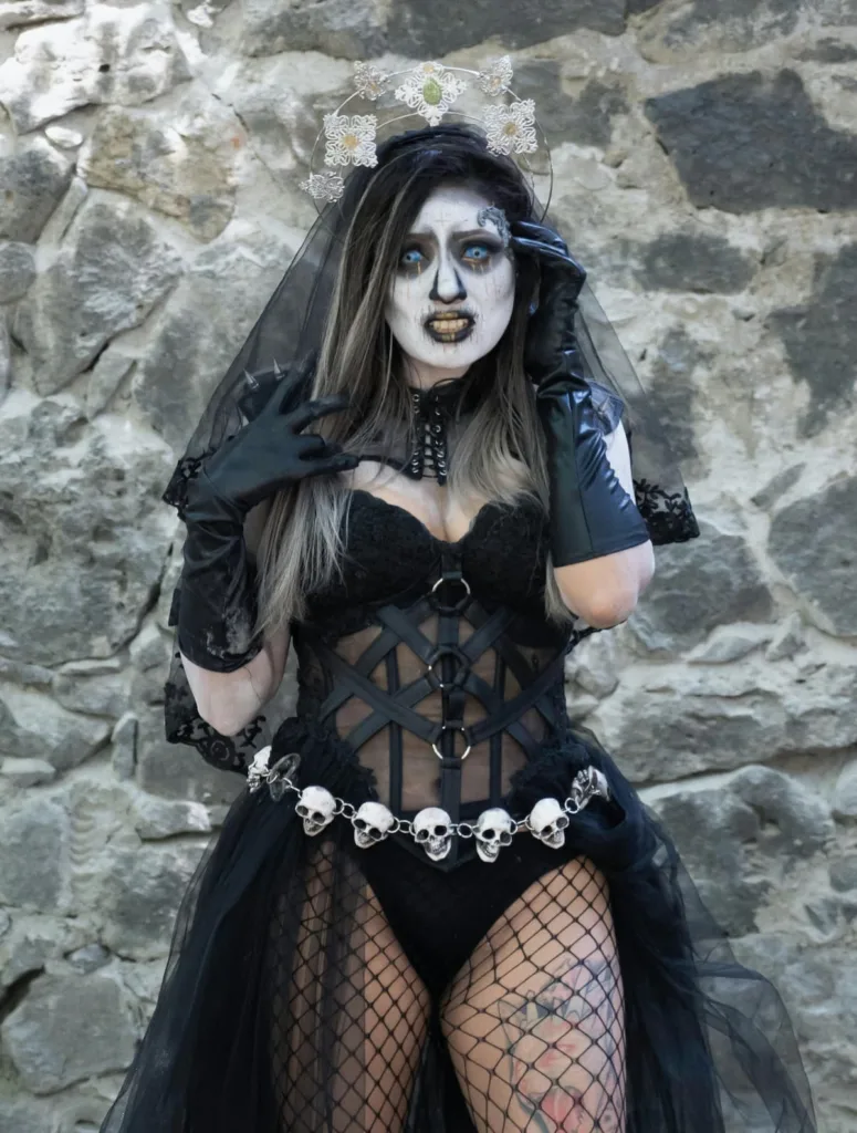 A scary woman with white painted face and black veil, long hand gloves, corset, panty,fishnet with skull heads as waist band