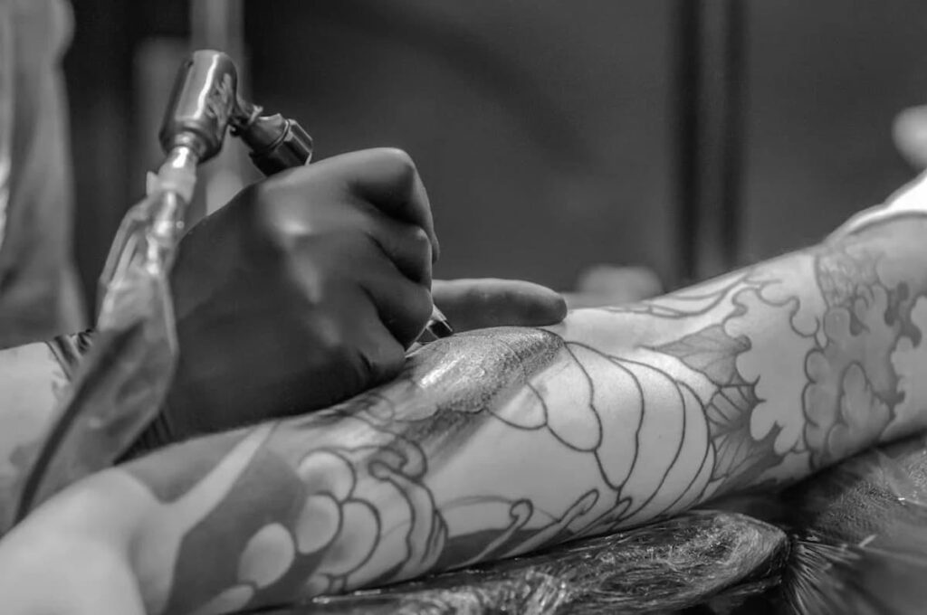 Tattoos and lymphoma an artist drawing tattoos